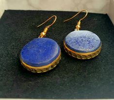 vintage lapis lazuli Kuchi earrings, Afghan jewelry, boho earrings, circle earrings,old blue earrings,gift for her,gift for mum,long earring measures approximately  4cm  Weight:9g Material:genuine lapis lazuli,  Nickle free gold plated metal. Beautiful round circle genuine lapis lazuli gold fram earrings. Minimalistically  designed with 18k gold plated. These earrings are inspired by the kuchi jewelry and they look amazing. Light to medium weight and great to wear all day. These earrings are great for everyday or any occasion. Makes a beautiful unique gift for: Valentines day  Mothers day  Anniversary  Birthday Blue Brass Round Jewelry, Blue Round Brass Jewelry, Artisan Gold Lapis Lazuli Jewelry, Artisan Gold Jewelry With Lapis Lazuli, Traditional Gold Jewelry With Lapis Lazuli, Traditional Gold Lapis Lazuli Jewelry, Gold Earrings With Natural Lapis Lazuli Stones, Handmade Lapis Lazuli Bohemian Earrings, Handmade Gold Lapis Lazuli Earrings