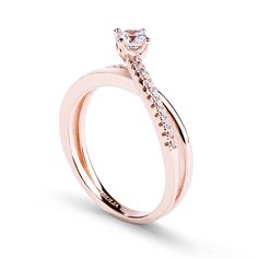 Dainty and delicate, this ring suits her feminine style. Created in rose gold tone, this ring showcases a round-cut stone at the center. Polished and stone-lined ribbons flank the center stone, creating the ring's charming split shank. As lovely as she is, this ring is a look she'll treasure. Carat Weight: 0.275 ctStone Size: 4 mmStone Type: Jeulia® StoneNumber of Stones: 1 Stone Color: Diamond WhiteStone Shape: RoundCarat Weight: 0.33 ctStone Size: 1.25 mmStone Type: Jeulia® StoneNumber of Ston Promise Rings Sterling Silver, Rings Sterling Silver, Sterling Silver Promise Rings, Promise Ring, Stone Settings, Quality Jewelry, Promise Rings, Crossover, Round Cut