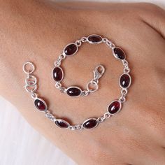 "Garnet Bracelet, 925 Sterling Silver Bracelet, Oval Gemstone Bracelet, Adjustable Bracelet, January Birthstone Bracelet, Minimalist Jewelry Gemstone Name - Garnet Stone Quality - AAA Weight - 5.21 gm Stone Length - 0.6 cm , Stone Width - 0.4 cm Bracelet Length - 6 inch to 9 Inch sizes are available, we give extra 0.5 inch adjustable in every bracelet. Stone Shape - As shown in the picture We serve complete 925 sterling silver Jewelry and genuine properties of the stone. The products are dispatc Bracelet Stone, Hippy Gifts, Bracelet Minimalist, Garnet Bracelet, Birthstone Bracelet, Garnet Jewelry, Wedding Jewelry Bracelets, January Birthstone, Birthstone Bracelets