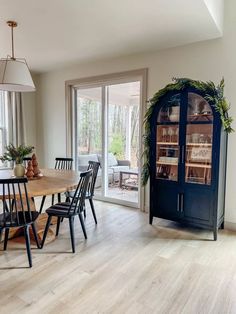 the dining room table is surrounded by chairs