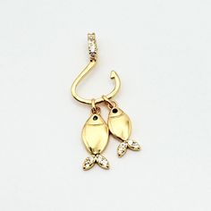 Due to Canada Post strike we have now paused shipping until the new year. Please message us with any questions. 18k gold plated brass cubic zirconia fish and hook pendants. Perfect for jewelry making such as earrings and necklace and other crafting projects.       Made out of 18k gold, brass, cubic zirconia       Clear / Gold colour Dimensions      about 26x9x1.5mm, hole 3x2mm Quantity      1 or 2 pieces per pack, choose from dropdown If you need help, please send us a message to assist in any w Gold Dangle Earrings With Fish Hook, Peace Jewelry, Fish Jewelry, Jewelry Making Earrings, Jewelry Pendants, Cubic Zirconia Jewelry, Making Earrings, Love Charms, Jewelry Pendant