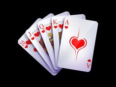 four hearts playing cards on a black background