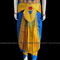 Design by Classical Dance Jewelry® ❥ Traditional Bharatanatyam costume wore during regular dance programs or arrangetram performance. ❥ Material : Art Silk ❥ Type : Traditional pant costume ❥ Easy to wear ❥ layer front fan ❥❥❥❥ 32 inch PANT LENGTH Dress Measurements ( all the measurements approximately 1 -2 margin buffer) Age: 9 - 12 yrs ❥ PANT MEASUREMENTS: ☛ Pant Length: 31-32 inch ☛ Pant Waist: 29-30 inch ☛ Pant Hip: 30-31 ❥ BLOUSE MEASUREMENTS: ☛ Blouse length: 11-12 inch ☛ Blouse Shoulder : Traditional Drape Blue Churidar For Festivals, Blue Churidar For Diwali Puja, Blue Churidar With Pallu For Festivals, Ceremonial Traditional Wear With Zari Work, Royal Ceremonial Traditional Wear With Zari Work, Royal Traditional Wear With Zari Work For Ceremonial Occasions, Royal Blue Traditional Wear For Puja, Royal Blue Traditional Drape For Puja, Blue Ceremonial Traditional Wear For Diwali