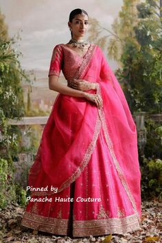 Make a statement with this vibrant hot pink wedding lehenga for bridesmaids by Panache Haute Couture. Crafted from premium fabric, this stunning lehenga features intricate embroidery and a flattering silhouette, perfect for adding a pop of color to any wedding celebration. Whether you're attending a traditional Indian wedding or a modern fusion ceremony, this bridesmaid lehenga will make you shine.   #HotPinkLehenga #BridesmaidLehenga #WeddingFashion #PanacheHauteCouture #IndianWeddingWear #BridesmaidOutfit #DesiFashion #BridalParty #WeddingSeason #EthnicWear #LehengaLovers #IndianFashion #WeddingOutfitIdeas #FusionWear #SouthAsianFashion #ModernBridesmaid #WeddingVibes #TraditionalWear #LuxuryLehenga #BridalInspiration Pink Raw Silk Lehenga, Pink Half Sarees, Raw Silk Embroidery, Online Wedding Dress Shopping, Hot Pink Weddings, Raw Silk Lehenga, Simple Lehenga