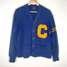 Vtg Lowe And Campbell Athletic Goods Cardigan Captain Sweater Size 42 Vintage Items Are Preowned, Not Brand New. May Contain Rips/Tears/Holes/Piling/Fraying/Fading/Smells. See Pictures Before Buying. I’m Pleased To Answer Any Questions You May Have. D2 Vintage Blue Cotton Cardigan, Vintage Blue V-neck Outerwear, Vintage Blue Outerwear For College, Retro Blue Cardigan For Winter, Vintage Blue V-neck Cardigan, Blue Vintage V-neck Cardigan, Fitted Retro Blue Cardigan, Retro Cotton Sweater With Buttons, Retro Cotton V-neck Outerwear