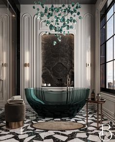 an elegant bathroom with black and white marble flooring, chandelier and bathtub