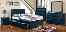 a blue bed with drawers underneath it