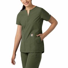 Blend style with function when wearing the Carhartt Force Essentials Women's Notch Neck Tunic Top. The notch neckline sits above the collar bone while the princess seaming gives this women’s scrub top a more tailored fit. The curved shirttail hemline not only adds style but length and along with the side hem vents sitting, bending, and reaching feels less restricted. Need pockets for your essentials? This stylish scrub top has large front patch side entry pockets with a besom seam hidden cell ph Carhartt Womens Scrubs, Carhartt Shirts For Women, Womens Long Sleeve Carhartt, Outdoor Button-up Tops With Patch Pockets, Cotton Nursing T-shirt Relaxed Fit, Carhartt Scrubs, Stylish Scrubs, Carhartt Womens, Safety Clothing