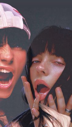 two women with their mouths open and one holding her hand up to her face while the other holds her mouth open