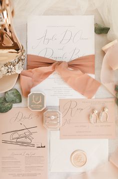 the wedding stationery is laid out and ready to be used