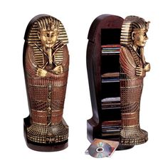 an egyptian statue is shown with cd's in it