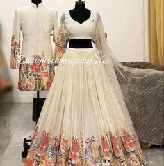 Perfect for Sangeet, engagement and wedding parties. All size available from XS to 5XL Fabric details-   Top & Lehenga-  Pure Georgette with intricate sequin and thread multi colour embroidery.  Men's sherwani- Same fabric as lehenga.  Dupatta - Net Matching daughter dress can be done as well.  Custom measurements will be taken after the order.  Making time- 10-15 days Shipping takes a week.  We will take kids size after the order. For any queries, please contact us. Fitted Wedding Palazzo Set With Dori Work, White Floor-length Party Wear Sets, Semi-stitched Resham Embroidery Skirt Set For Wedding, White Fitted Anarkali Set For Party, Wedding Skirt Set With Resham Embroidery, White Unstitched Party Wear Lehenga, Unstitched White Lehenga For Party, Semi-stitched Skirt Set Saree For Wedding, Fitted Palazzo Set For Navratri Party