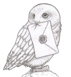 an owl is sitting on top of a rock with a letter in it's beak