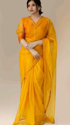 _*RELAUNCHING NEW DESIGNER SAREE FOR POHELA FALGUN BOISHAKH FESTIVAL*_  _*VT-YAMINI*_  *Looking For This Celebrities Designer Saree On Premium Orgenza Febric WITH Piping with Khatli Blouse Work*  • *For your upcoming festive or party or marriage entry*....💁🏻🌷  *Pairs with Stiched Bangalori SiLk And Orgenza blouse with Khatli Hand Work and CUB*  *BLOUSE SIZE 40 INCH WITH BOTH SIDE 2 INCHES MARGIN*  *✅ Price :- 1350/-♥️*   Ready stock🙂🙂  *Dont compare our quality with others* Heavy Organza Saree, Saree Blouse Styles, Latest Model Blouse Designs, Yellow Saree, Elegant Blouse Designs, Unique Blouse Designs, Saree Blouse Designs Latest, Stylish Blouse Design, Unique Blouse