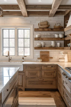 a kitchen with wooden cabinets and white counter tops in front of open shelves on the wall