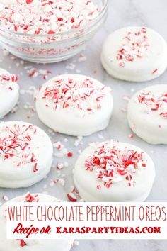 white chocolate peppermint oreos with red and white sprinkles on top