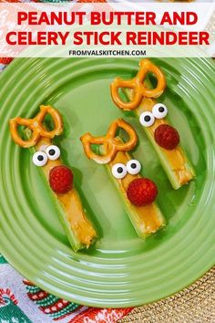 a green plate topped with pretzel sticks and candy eyeballs on top of each other