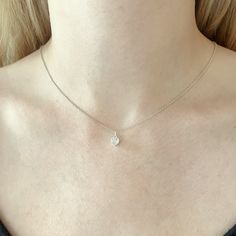 This dainty necklace features a sweet little heart charm with just a hint of sparkle. The tiny charm is a clear cubic zirconia that is bezel set in sterling silver. The heart is quite petite at 6mm wide but the bezel is on the thicker size so the charm has some depth to it. The heart slides freely along sterling silver cable chain for a minimalist design that's both understated and charming. The simple design makes the necklace quite versatile and hearts will always be in style. The necklace is Romantic Necklace, Sterling Silver Heart Necklace, Tiny Charm, Everyday Necklace, Silver Heart Necklace, Silver Spring, Gift For Wife, Small Heart, Minimalist Necklace