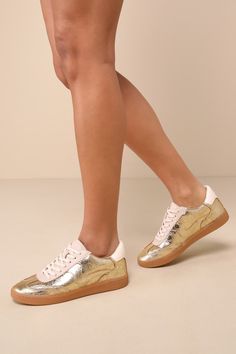 Trendy Metallic Lace-up Sneakers, Designer Leather Sneakers For Spring, Metallic Sneakers With Perforated Toe Box, Trendy Metallic Round Toe Sneakers, Leather Sneakers With Perforations, Trendy Leather Sneakers With Flat Heel, Gold Leather Sneakers With Gum Sole, Trendy Sneakers With Leather Sole And Flat Heel, Trendy Leather Sneakers With Gum Sole