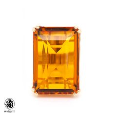 This beautiful setting has a orange Citrine and the shank has nice swirl gallery. The ring has Emerald cut Citrine gemstone, set in the center. [MATERIALS] Center Stone: Citrine Carat : 63.17 Clarity: Eye clean Color: Orange Cut: Emerald Measurement of the stone: 31 mm X 22 mm Setting: Prong Metal: 13.0 Grams of 14 KT yellow Gold [ORDERS] All items that are made to order takes about 7-12 days to create and to ship. [ADDITIONAL REQUESTS] If you would like to see more pictures of this item, please Formal Citrine Orange Rings, Formal Orange Rings With Accent Stones, Formal Orange Topaz Rings, Orange Citrine Ring With Polished Finish, Orange Citrine Rings With Polished Finish, Yellow Stone Ring, Yellow Stone Rings, Yellow Citrine Ring, Orange Citrine