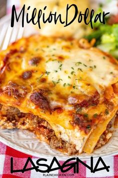 a plate with lasagna covered in cheese and sauce next to broccoli