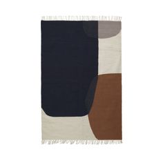 an area rug with various colors and shapes on it, including black, white, brown, and blue