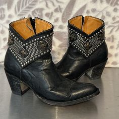 Old Gringo Clovis Black Western Style Silver Ball Embellished With Crosses Cowboy Booties In Good Preowned Condition Size 6.5 B Embellished Leather Boots With Snip Toe, Western Boots With Silver Studs And Round Toe, Black Boots With Silver Accents And Round Toe, Black Western Boots With Rhinestone Rivets, Leather Boots With Silver Accents And Round Toe, Embellished Black Ankle-high Boots, Leather Rhinestone Ankle-high Boots, Leather Ankle-high Boots With Rhinestones, Black Ankle Boots With Silver Studs