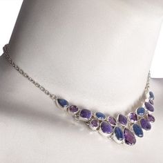 "Kyanite Charoite and Amethyst 925 Silver Choker Necklace * Bracelet in the picture is shown only to demonstrate a mix and match combination. Price quoted only for the necklace. Product Detail- Width2.50 cm Weight31 Gms Approx Size18' + 2\" Ext. Extra MetalSilver Stone Detail- AmethystMix Shapes (7 Pcs) KyaniteMix Shapes (6 Pcs) CharoiteFancy (5 Pcs) Braclets details: Product Detail- Width1.70 cm Weight17.25 Gms Approx Size7.50 to 8.50 Inch MetalSilver Stone Detail- AmethystMix Shapes (4 Pcs) Ky Purple Multi-stone Pendant Necklace, Purple Multi-stone Necklace For Gift, Purple Multi-stone Necklace Gift, Silver Choker Necklace, Bangles Indian, Silver Choker, Star Gift, Bangle Set, Necklace Sterling Silver