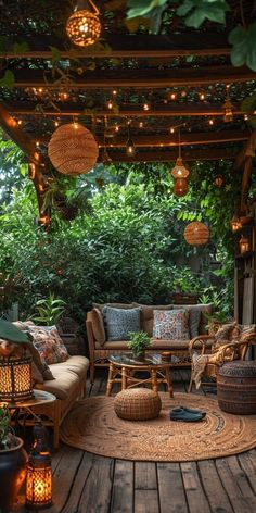 an outdoor living area with lots of lights and furniture