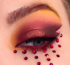 Red Diamond Eye Makeup, Red Eyeshadow With Rhinestones, Red Gemstone Eye Makeup, Orange Eyeshadow Looks With Rhinestones, Orange Gold Eyeshadow, Sunset Eyeshadow, Fire Makeup, Face Rhinestones