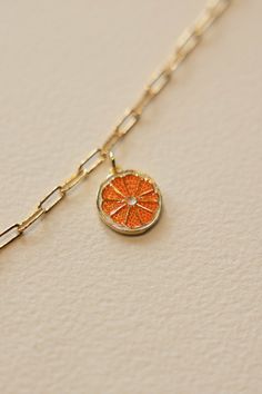 Gold filled enamel orange slice charm is sweet and summery. Add some joy to your charm necklace with this bright and summery slice. Hand make your custom charm necklace in Laguna Beach or build your piece online through adding a base necklace and your selection of charms. Leave us a note on your order for any special requests. gold filled Tarnish resistant Enamel Orange Charm Jewelry For Gifts, Orange Pendant Charm Necklaces For Gifts, Charm Bar, Orange Slice, Nice Outfits, Custom Charms, Ceramic Gifts, Gold Charm Necklace, Candle Collection