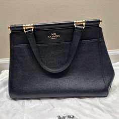 Gently Used; Pebbled Black Leather With Gold Hardware, Can Be Worn By The Handles Or Strap. Adjustable Strap And Dust Bag Included Elegant Coach Bags, Elegant Coach Shoulder Bag With Top Carry Handle, Elegant Coach Bag For Formal Occasions, Elegant Formal Coach Bag, Coach Satchel, Gold Hardware, Coach Bags, Adjustable Straps, Dust Bag