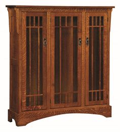 a wooden cabinet with glass doors on the front