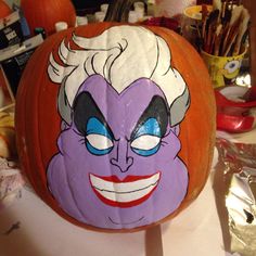 a pumpkin decorated with an image of the villain