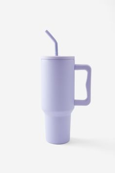 a purple cup with a straw in it