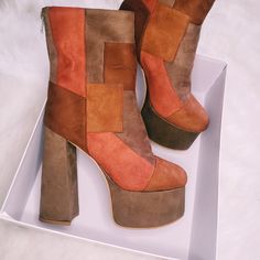 Step into the '70s groove with our Suede Patchwork Platform Boots. These earthy brown shades and retro suede patchwork design are a timeless fashion statement. The platform sole offers both comfort and style, taking you back to the era of flower power and free spirits. Elevate your style and embrace the '70s with every step. Unique Suede Patchwork Design Comfortable Platform Sole Timeless '70s Aesthetic Durable Construction Suede Patchwork, Patchwork Boots, 70s Aesthetic, Earthy Brown, Brown Shades, Patchwork Designs, School Fashion, Platform Boots, Free Spirit