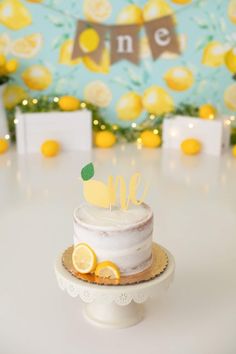 a white cake with lemons on the top