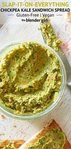 guacamole spread in a glass bowl with a spoon next to it