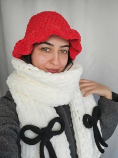 Long and soft hand knit cream winter scarf 💗💗 and cute knit bows🎀 width:11.8" lenght:78" materials: %100 micropolyester You can use it as a balaclava or shawl. Color and size can be customized. You can always send a message for this.🌼 Red crochet bucket hat is also available in my shop.  Don't forget to check out my Etsy shop and Instagram page for more hand knitted scarves.✨️ https://buttercuphandmadex.etsy.com https://www.instagram.com/buttercupatelier . . . . . . . . . . . . . . . . bow knit scarf, valentines day gift for girlfriend, valentines day outfit, knit bow, ribbon bow crochet, ribbon bow, bow trends, handmade bow scarf, handmade scarf with ribbon bow, hand knit scarf with ribbon bow, knitted chunky scarf, knit soft fluffy scarf, cute scarf, warm winter scarf, fairycore, coq Hand Knitted Scarves, Fairycore Coquette, Chunky Hand Knit, Trendy Scarves, Bow Scarf, Coquette Girl, Knitted Scarves, Knitted Balaclava, Cute Scarfs