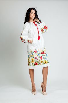 The summer dress has embroidered sleeve and the clasp treated embroidered lace. The main motive of embroidery - poppies, daisies, cornflowers and viola. Please, select you size: Bust S 84-88(cm) 33-35,5 (inches) M 92-96(cm) 36.2-37,7 (inches) L 100-104(cm) 39,3-40,9 (inches) XL 108-112(cm) 42.5-44 (inches) XXL 116-120(cm) 45.6-47.2 (inches) Hips S 92-98 (cm) 36,2-38,6 (inches) M 99-106(cm) 39-41.7 (inches) L 107-115(cm) 42.1-45.3 (inches) XL 116-125(cm) 45.7-49.2 (inches) XXL 126-135(cm) 49.6-53 Embroidered Midi Dress For Garden Party, Embroidered Knee-length Midi Dress For Garden Party, Garden Party Midi Dress With Embroidered Hem, White Peasant Embroidered Dress, Spring Folk Dress With Floral Print, White Embroidered Maxi Dress For Daywear, White Peasant Dress With Embroidered Hem, Traditional Long Dress For Spring, Peasant Style Embroidered Tunic Dress For Spring