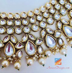 Ravishing Heavy High Quality White Kundan Set Necklace Earring Tikka Set. - High Quality Original Kundan Set - Necklace with Hanging Beads - Small Earrings - Small Elegant Tikka Shop for more KUNDAN SETS. Why Amazel Designs? Customer Testimonial - Aisha, Canada My experience with Amazel designs was amazing! She was super nice and the product was just as expected. It was beautiful and the quality was great! Thank you for the excellent and fast service! :) I will definitely be ordering more stuff! Hanging Beads, Kundan Set, Chur, Customer Testimonials, Kundan Necklaces, Set Necklace, Earrings Small, I Design, Small Earrings