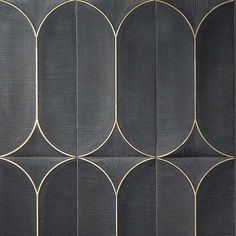 a black and gold wallpaper with circles on it's sides, in an art deco style