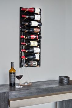 caption Black Panel with Single Deep Satin Gold Pegs (discontinued peg finish Wine Wall Display, Wall Wine Rack, Perimeter Lighting, Mounted Wine Rack, Led Accent Lighting, Wall Mounted Wine Rack, Wine Wall, Wine Display, Wine Rack Wall