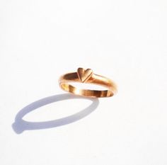 "SUPER HAPPY NEW YEAR EVEYBODY I am SO GLAD to inform ALL of you that we are now back to normal activities With a \"puffy\" heart on top, this 10K rose gold ring is the classic representation of passion with elegance, simplicity and romance all in one single piece. The heart measures 3/16\" by 3/16 and it can be made in sizes 4 to 8 There will be an extra charge for sizes 8.5 and up depending on the number. Available in Sterling Silver,14K and 18K Rose, Yellow, White, and Gray Gold- and Platinum Minimalist Rose Gold Heart Ring For Promise, Classic Rose Gold Heart Ring For Valentine's Day, Classic Rose Gold Heart Promise Ring, Minimalist Rose Gold Heart Promise Ring, Classic Heart-shaped Rose Gold Ring, Classic Heart Shaped Rose Gold Ring, Classic Rose Gold Heart Ring For Wedding, Classic Rose Gold Heart Ring, Fibonacci Necklace