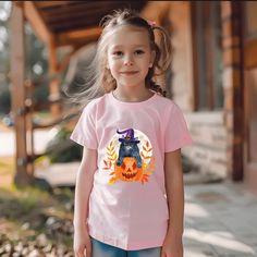 Celebrate the spookiest season of the year with our unique Halloween T-shirts! Designed to bring a smile and a bit of fright, these shirts are perfect for any Halloween event, from trick-or-treating to family gatherings. Each design combines comfort with festive flair, ensuring you or your child can enjoy the Halloween spirit in style. Crafted from soft, durable materials, our shirts are made to last through all your Halloween adventures. Whether you're looking for a fun costume alternative or a Pink Halloween T-shirt With Character Print, Cat With Pumpkin, Halloween Adventure, Halloween T Shirts, Spooky Pumpkin, Halloween Outfit, Halloween Event, Unique Halloween, Halloween Spirit