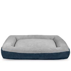 the dog bed is grey and blue with a large pillow on it's side