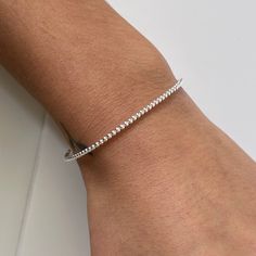 The perfect minimalist ball bracelet - you'll put it on and never want to take it off. Wear it on its own or layer with other pieces from our collection. 💖 Details Balls: approx 2 mm Width: 2 mm Length: 17.5 💕 Online store: www.thejewellerytree.net 💕 Stay up-to-date with new designs & special offers  - Join our online community - FOLLOW ME   Socials: @myjewellerytree OR  https://www.facebook.com/thejewellerytree1/  💕 Need more info, feel free to email or DM - I'd love to help 💕And please visit my store https://www.etsy.com/au/shop/TheJewelleryTreeCo to see lots more quality sterling silver and gemstone jewellery We care about the environment so when you buy any of our pieces, you'll receive beautiful long lasting jewellery with minimal packaging - a card made of recycled paper and a s Minimalist Sterling Silver Tennis Bracelet For Everyday, Minimalist Hypoallergenic Round Bead Bracelets, Everyday Ball Chain Bracelet, Minimalist Ball Chain Bracelets For Everyday, Minimalist Ball Chain Bracelet, Minimalist Everyday Ball Chain Bracelets, Adjustable Sterling Silver Ball Chain Bracelet, Minimalist Everyday Ball Chain Bracelet, Minimalist Flexible Chain Bracelet