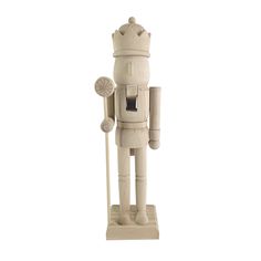 a white wooden toy with a crown on it's head and cane in his hand