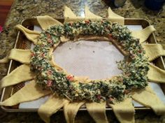 a homemade wreath made out of tortilla chips