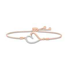 Show your whimsical side with this charming diamond heart bolo bracelet. Fashioned in sterling silver with 14K rose gold plate, this design features a sideways asymmetric heart-shaped outline sparkling with diamonds along one side. Captivating with 1/10 ct. t.w. of diamonds and a bright polished shine, this wheat chain bracelet adjusts up to 9.5 inches in length and secures with a bolo clasp and ball ends. Rose Gold Plate, Bolo Bracelet, Diamond Heart, Infinity Bracelet, Sterling Silver Bracelets, Rose Gold Plates, Chain Bracelet, Wheat, Design Features